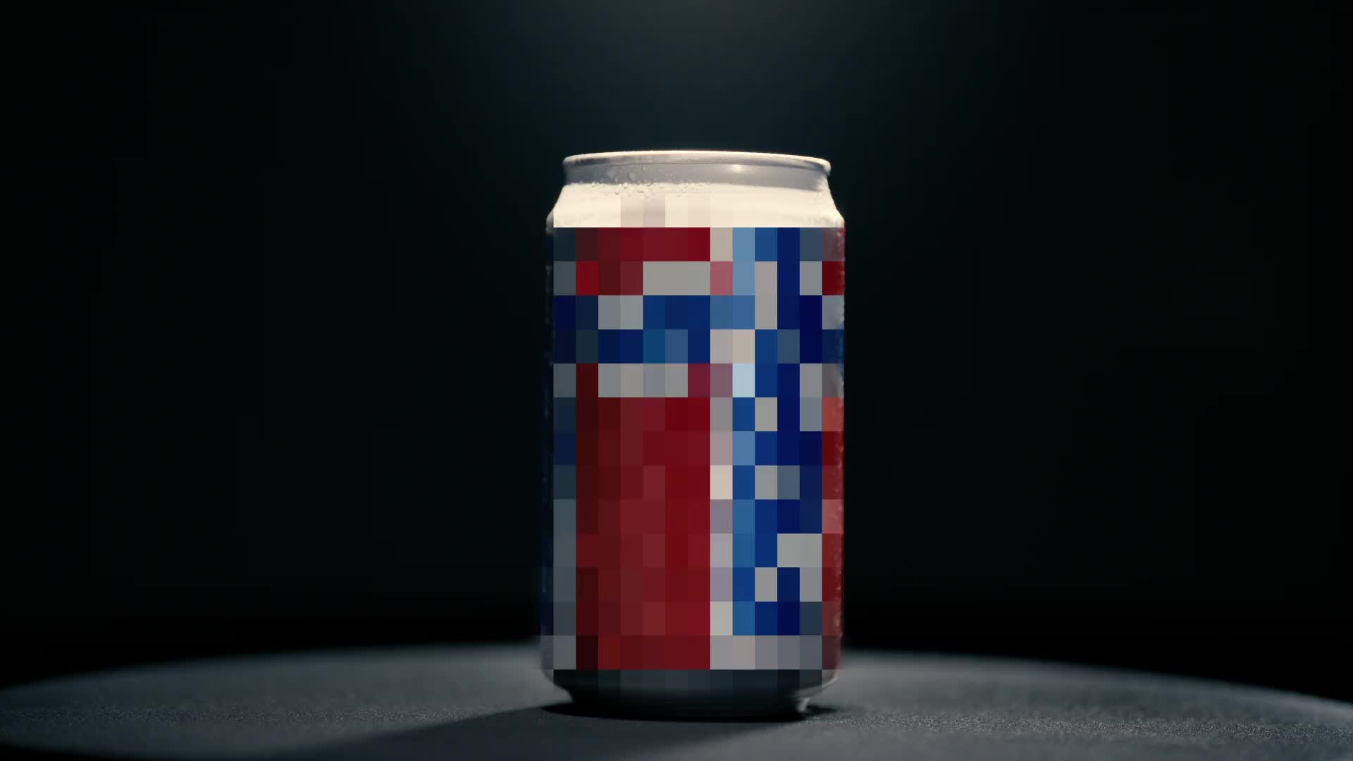 A blurred can of soda